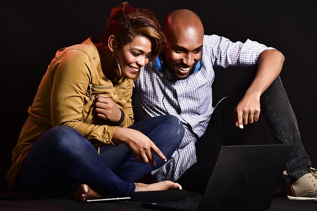 real estate investors watching ted talks on laptop
